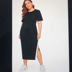 black tshirt dress with white stripes on side.